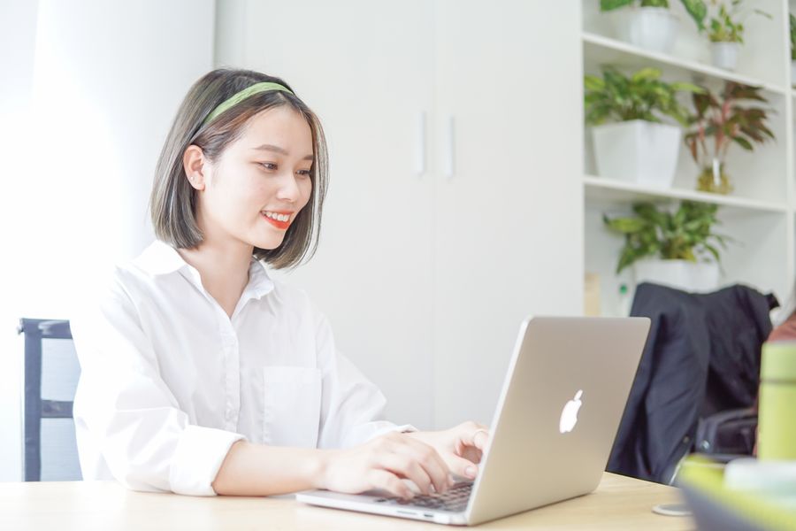 Smiling woman working at a desk
